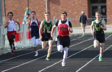 Josh Jessen leads the pack in the 200 meter dash at the 2019 Yutan Track Invite.  Jessen missed out on a sophomore season due to COVID-19 and is excited to get the opportunity to compete as a junior this year.