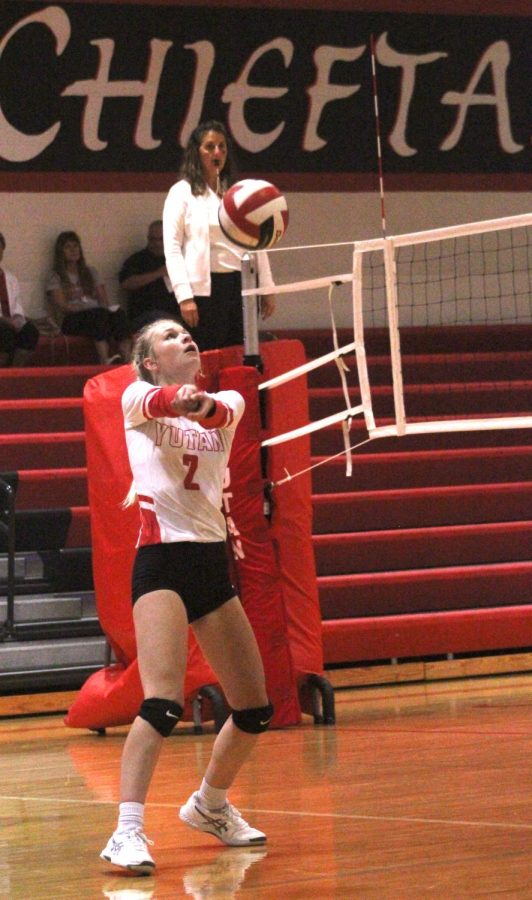 Senior Haley Bedlan passes the ball to the other team. Bedlan leads the team in kills this season.