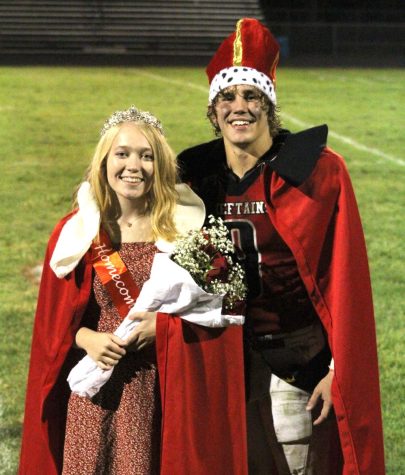 Seniors Jesse Keiser and Heidi Krajicek smile for the camera  after they were crowned Homecoming King and Queen. The coronation took place directly after the homecoming football game against Wilber-Clatonia. 