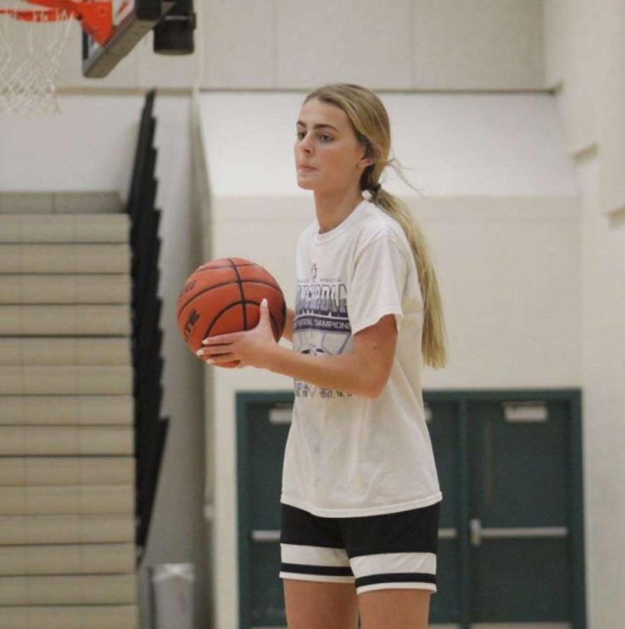 Junior Kennedy Andrews practices at her previous school, Millard West, last season. Andrews played for the Wildcats her freshman and sophomore year. 