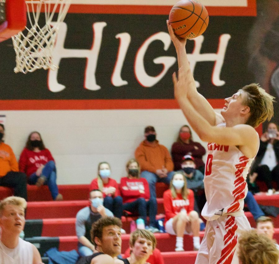 Senior Sam Petersen scores a basket for the Yutan Chieftains. The team started last season playing Elmwood-Murdock. The Chieftains won 70-39.