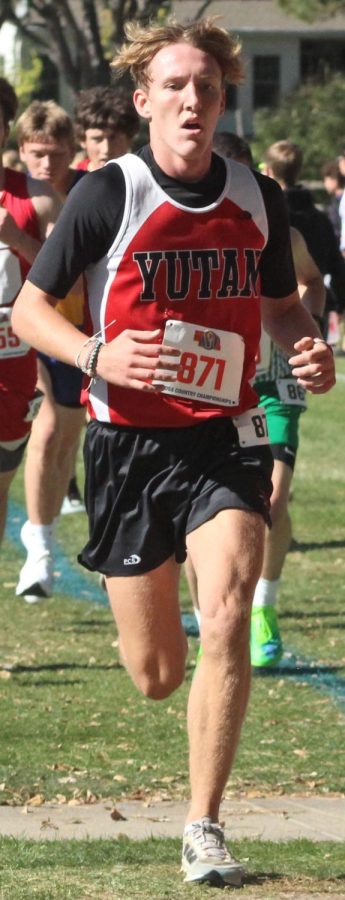Senior Isaac Kult races ahead of the competition at the state cross country meet. Kult ran 55th out of 132 runners.