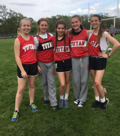 Seniors Heidi Krajicek, Lilly Watson, Kendyl Egr, Bennan Jacobs and Christina Kerkman pose for a track photo in seventh grade. In seventh grade nine senior girls were out for track while there are now only four.