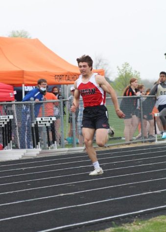 Senior Josh Jessen pushes through his sprint. Jessen placed fifth in the 200-meter dash and sixth in the 100-meter dash at the state meet. 