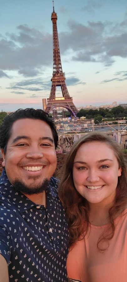 Spanish teacher Kalyn Blazer and her husband pose in front of the Eiffel Tower. The Blazers traveled to Europe for their honeymoon.