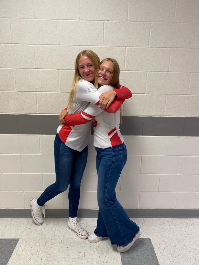 Sophomore Gabi and junior Bella Tederman stop for a photo before team pictures. This is Gabi and Bellas second year playing highschool volleyball together.