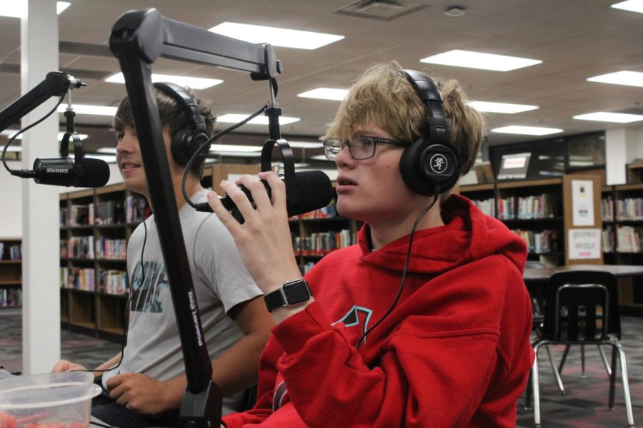 Junior Nathan Rupp and senior Kaeden Anderson record for a podcast for the new STRIV class. The class plans to release a weekly podcast, which can be found on the Yutan Public Schools Youtube channel.