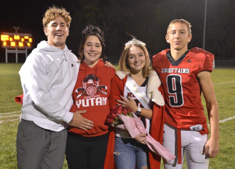 After winning homecoming queen, Abby Keiser poses with her siblings (from left to right) Jesse Keiser, Austin Beutler and freshman Tyler Keiser. Both Jesse and Austin won homecoming king or queen before Abby.