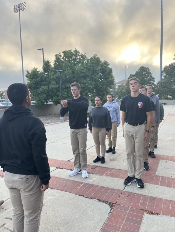 Carter Tichota (front right) stands at attention waiting for his flight commanders next command. Tichota is part of a special group within ROTC that meets every Friday from 5-7 p.m. 