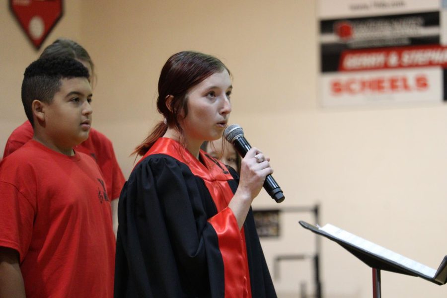 Senior Janel Bussing performs a solo in the Veterans Day program. This year the choir honored veterans by singing Everyday Heroes. 