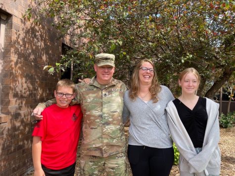From left to right, TJ, Nate, Leanna and Madi Ledden pose for a family picture. Both Nate and Leanna are members of the Nebraskas Army National Guard.