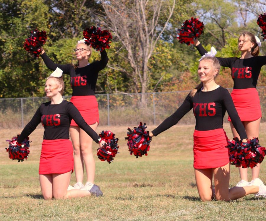 From left to right, Ellie Lloyd, Andi Nelson, Mylee Tichota and Libby Winn perform their cheer dance during the Chieftain Games. The cheerleaders performed the same dance during half-time at the homecoming football game. 