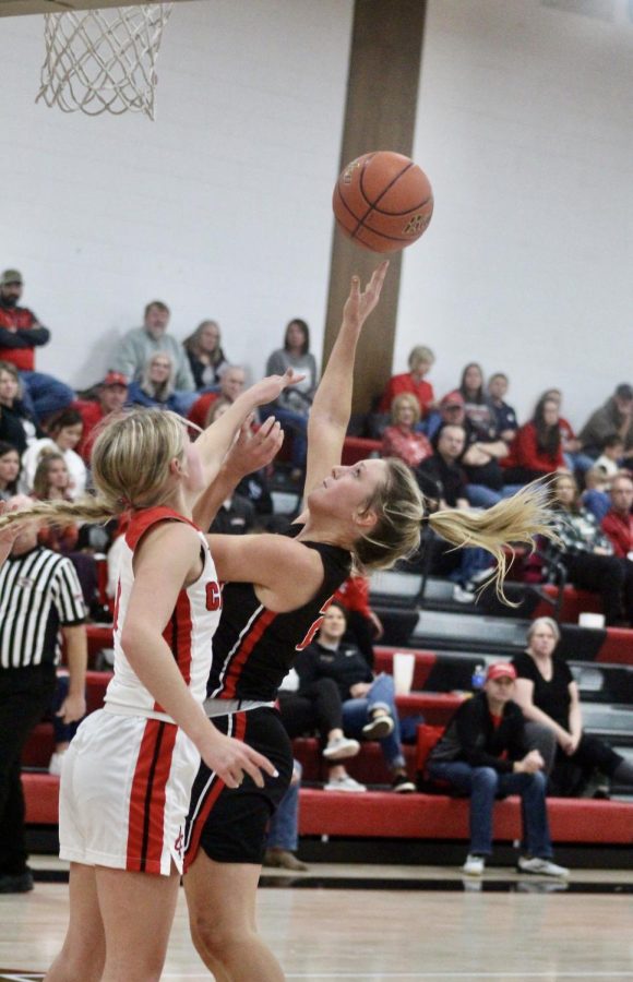 Senior Laycee Josoff goes up for a block shot against West Point-Beemer. Josoff scored 12 points to secure the win.