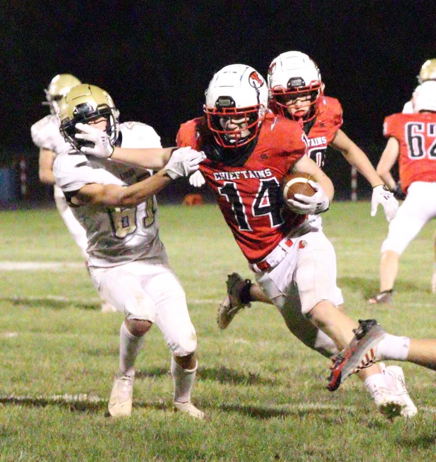 Junior Jesse Kult runs the ball towards the end zone. Kult had 5 touchdowns this season.