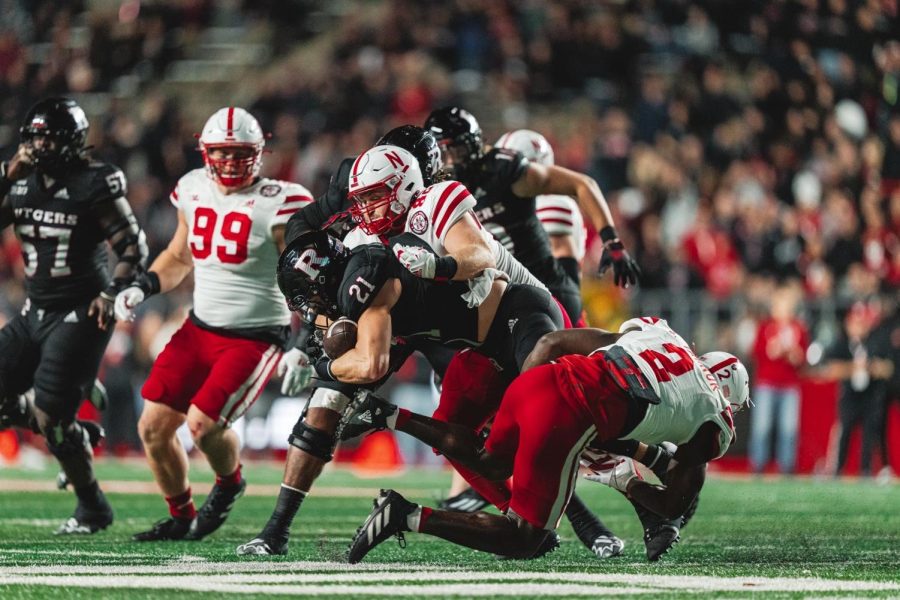 Nebraska defensive lineman Colton Feist tackles a Rutgers ballcarrier. Feist finished with 46 total tackles on the year.