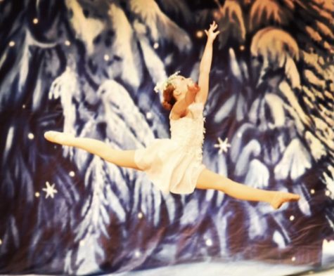 Freshman Kylie Krajicek leaps across the stage during the Snow Scene in the 2018 production of The Nutcracker. Krajicek has played over 20 roles in her time performing The Nutcracker at RSDA.