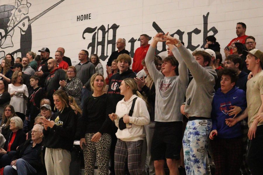 Students cheer on the boys basketball team during the 1st round sub districts. Almost all games have a student section with multiple cheers the whole game as well as a theme.