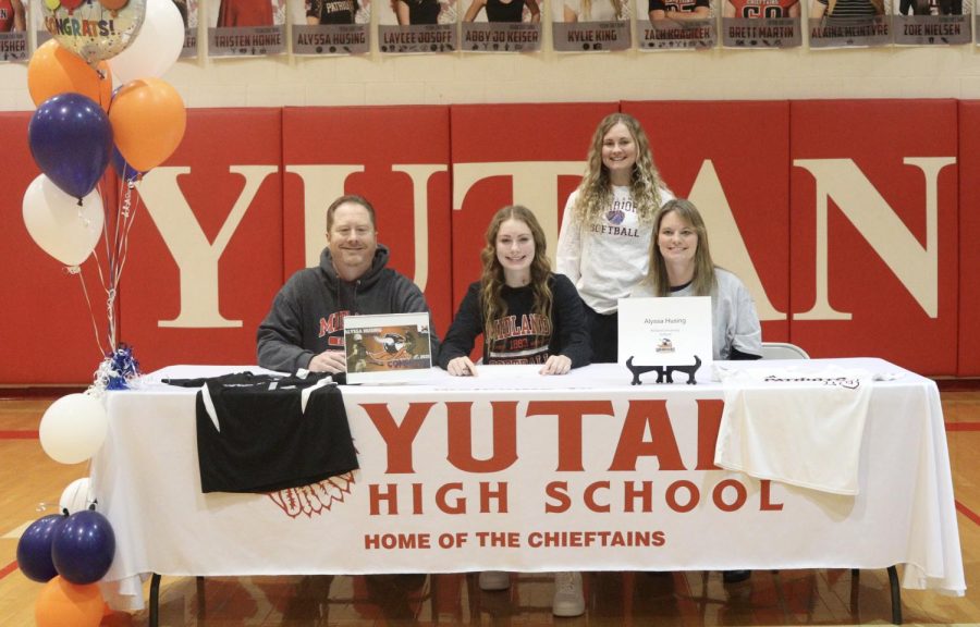 Senior Alyssa Husing smiles for the picture after signing to play softball at Midland University. Because she played softball since she was five, deciding to play in college was an easy choice.
