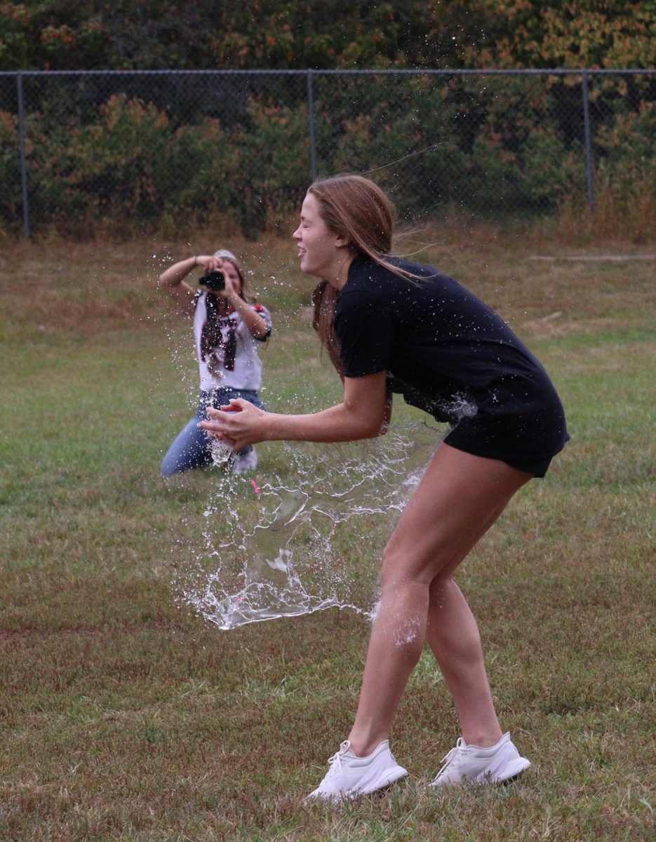 During the Chieftain Games, Sophomore Makenzie Govier’s water balloon explodes as it hits her hands. She and her partner, fellow sophomore Mylee Tichota, were one of the last people out in the competition. “It was really fun and I liked being partners with Mylee,” said Govier.