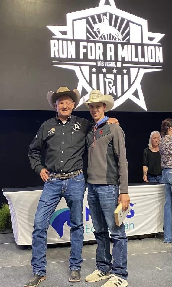 Senior Cooper Leather and reining horse professional Steve Ross pose for a picture at the Run for a Million horse show in Las Vegas. In August, Leather competed at this show against 89 other competitors in his age division. 