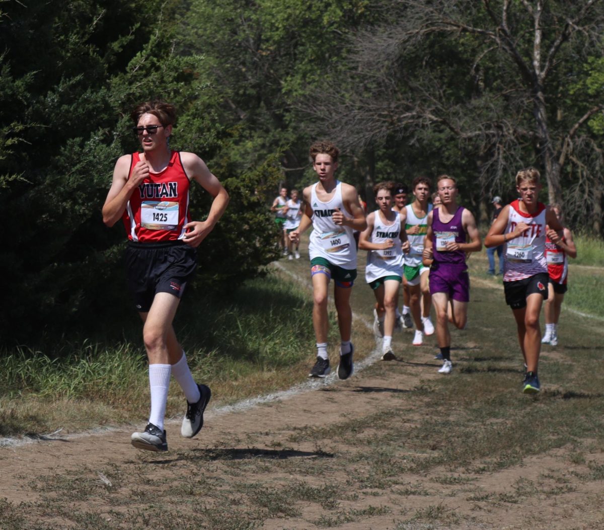 Bryce Kolc running in the front of the pack at Platte River Rumble. Kolc doesnt plan on running for college, but wants to try running marathons in college.