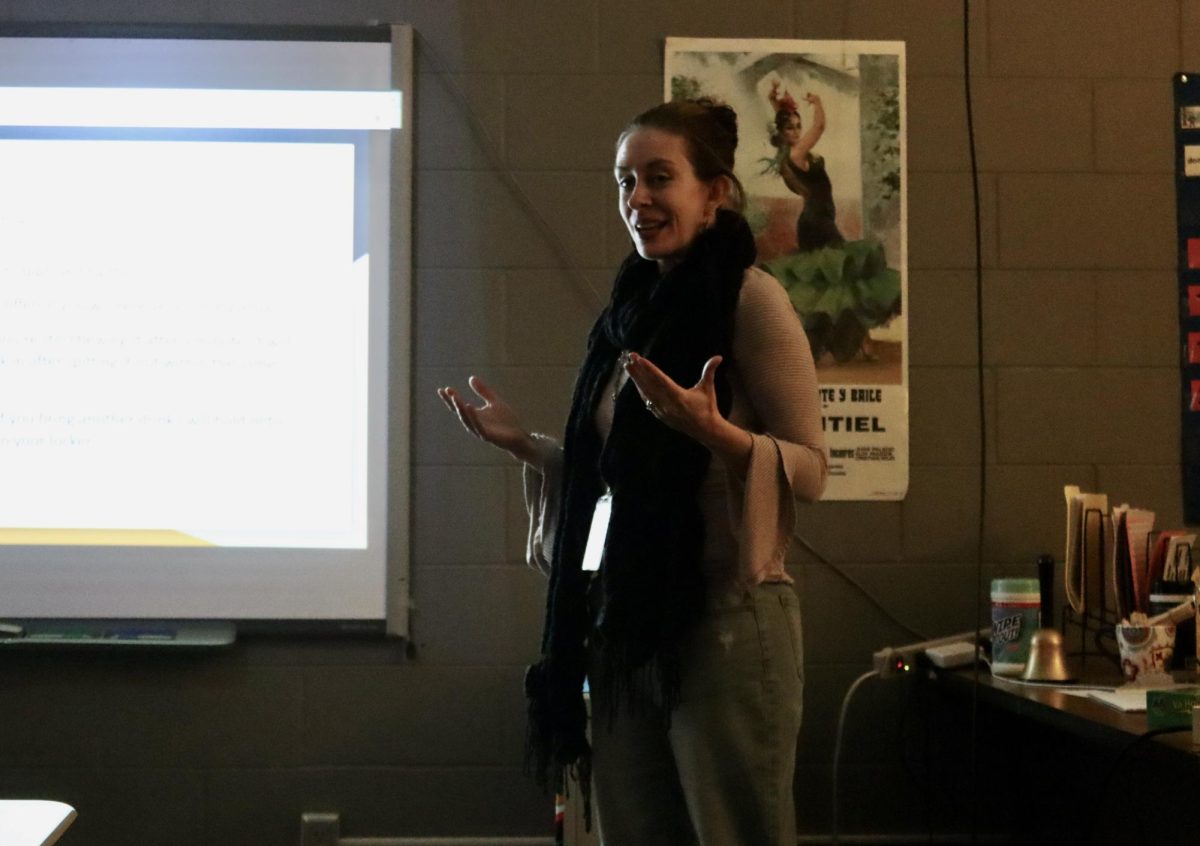 Spanish teacher Megan Widmer reviews class expectations to her Spanish 2 students. Next semester, she plans to create a more fun learning environment in her classroom. 
