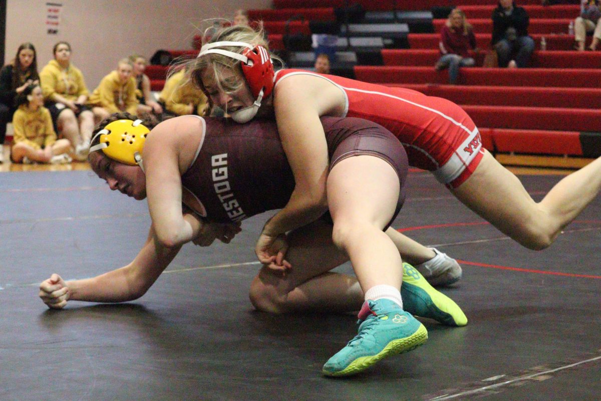 Campbell works to take down her Conestoga opponent. She currently has a record of 5-1.