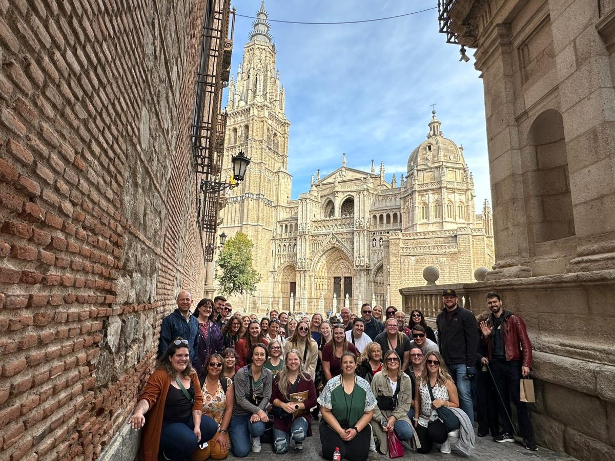 full group with Cathedral of Toledo in background