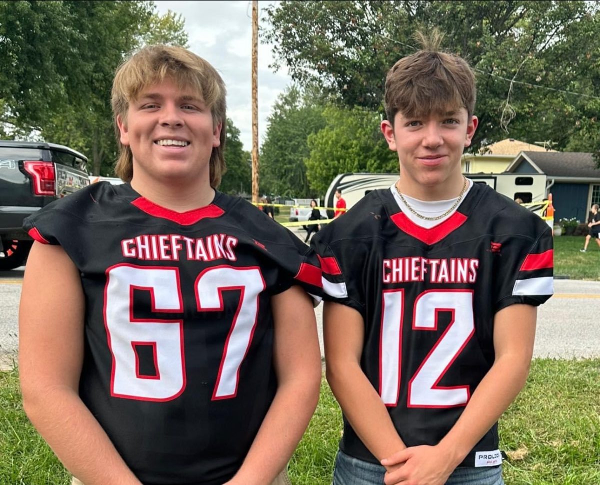 From left to right, senior Caleb Daniell and freshman Nathan Daniell pose for a picture before a football game. Football is the only season they play together. Quote, Nathan said.