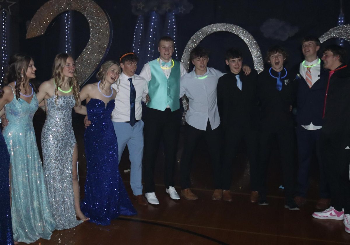 During one of the final songs of the dance, starting from the left juniors and seniors Libby Winn, Gabi Tederman, Britney Zeleny, Braxton Wentworth, AJ Arensberg, Tannen Honke, Max Egr, Connor Engel, Jack Edwards and Derek Wacker sway back and forth together. This years prom theme was Under the Stars.