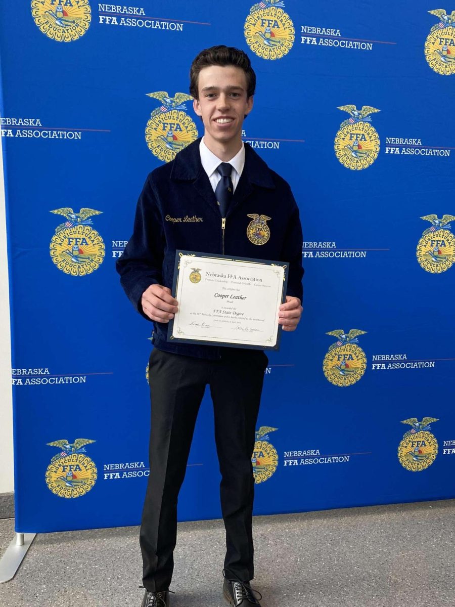 Senior Cooper Leather poses with his FFA State Degree. Leather plans on pursuing a career ...