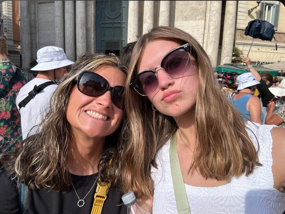 Fallon and Libby Winn pose for a selfie in front of the Trevi Fountain in Rome, Italy. Out of all the sights on the international trip, the fountain was their favorite bonding moment. 