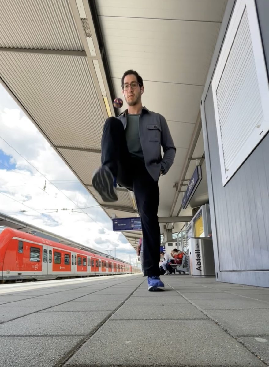 Math teacher Joel Carrillo plays with a little ball at a train station in Germany. Carrillo spent four days in Germany.