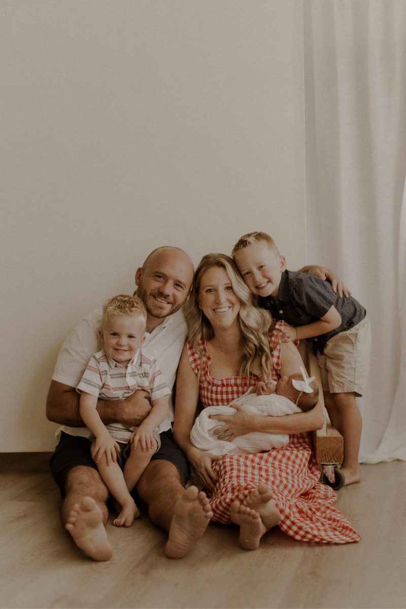 Adam Vogt and his family pose for a picture with baby Ava. Vogt and his wife had the name picked out ever since they had their first child.