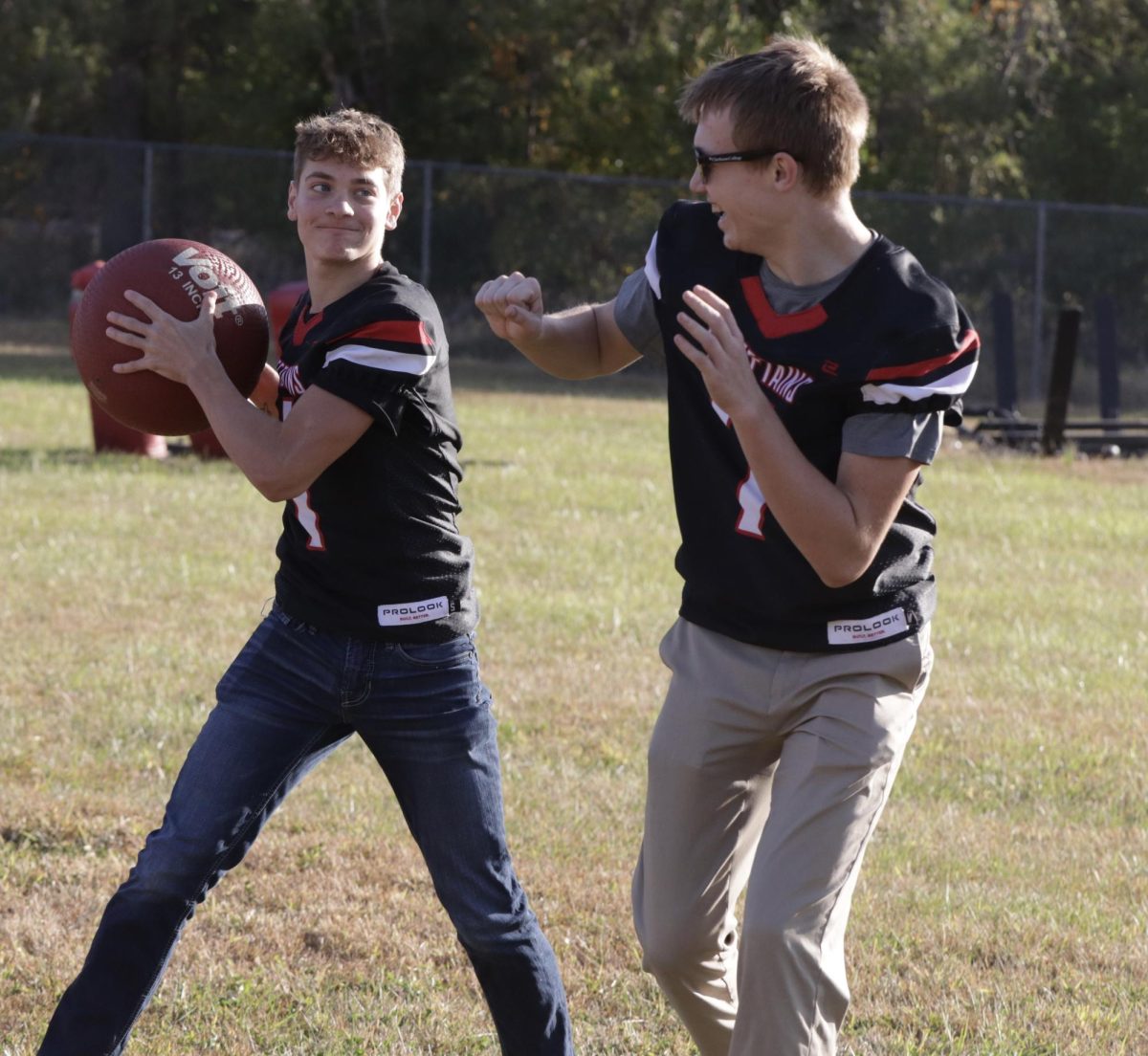 While playing kickball, senior Owen Egr gets ready to throw the ball at senior Drew Krajicek. Kickball was one of the four rotations added to the morning schedule. “We competed against the sophomores, so obviously we won and demolished them,” Krajicek said.