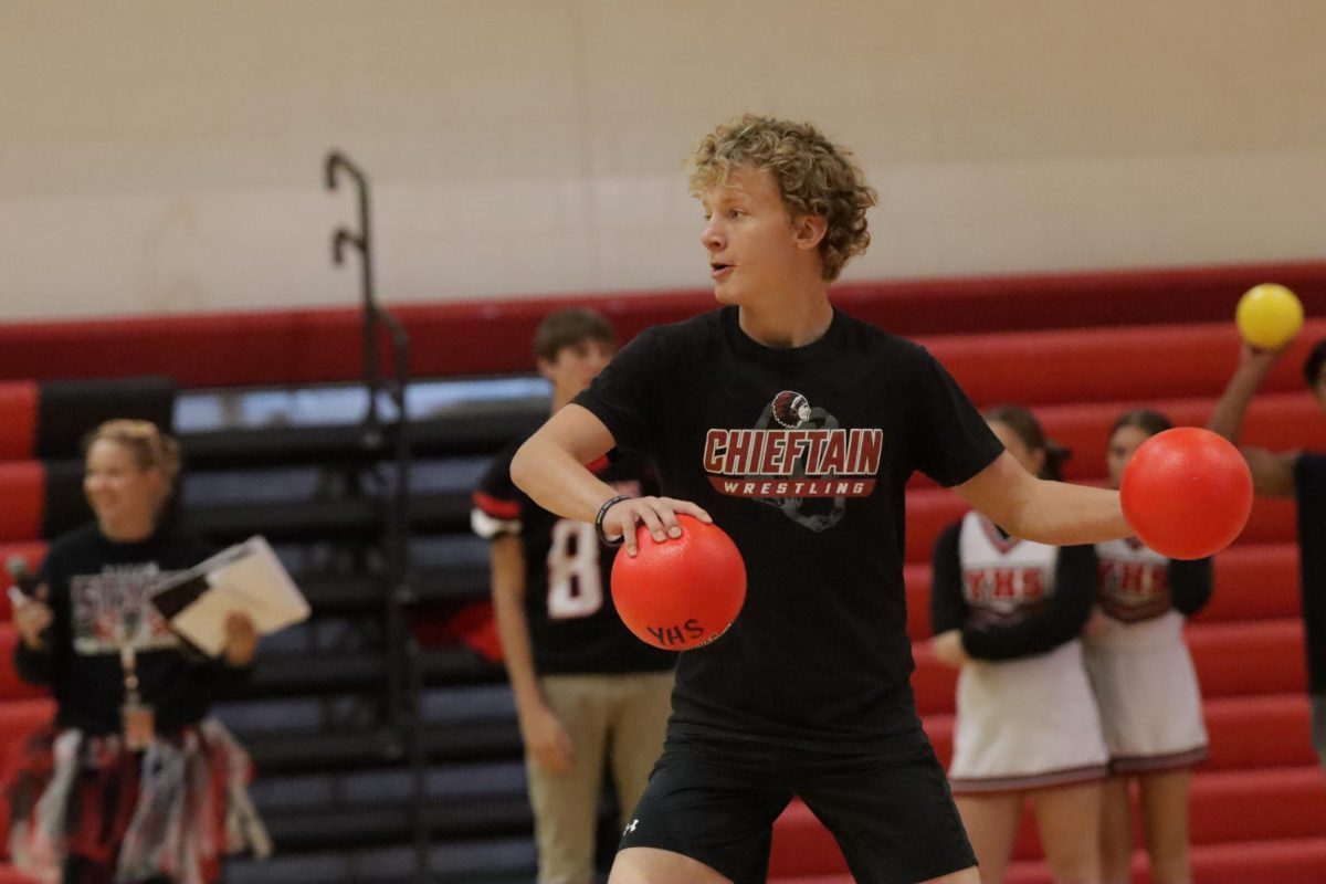 During the dodgeball tournament, sophomore Eli Kult aims towards his opponents. The dodgeball tournament is one of few Chieftain Games that has stayed a tradition each homecoming week. “Playing dodgeball every year during homecoming is a fun tradition,” said Kult. “I like hitting other kids with the balls.”