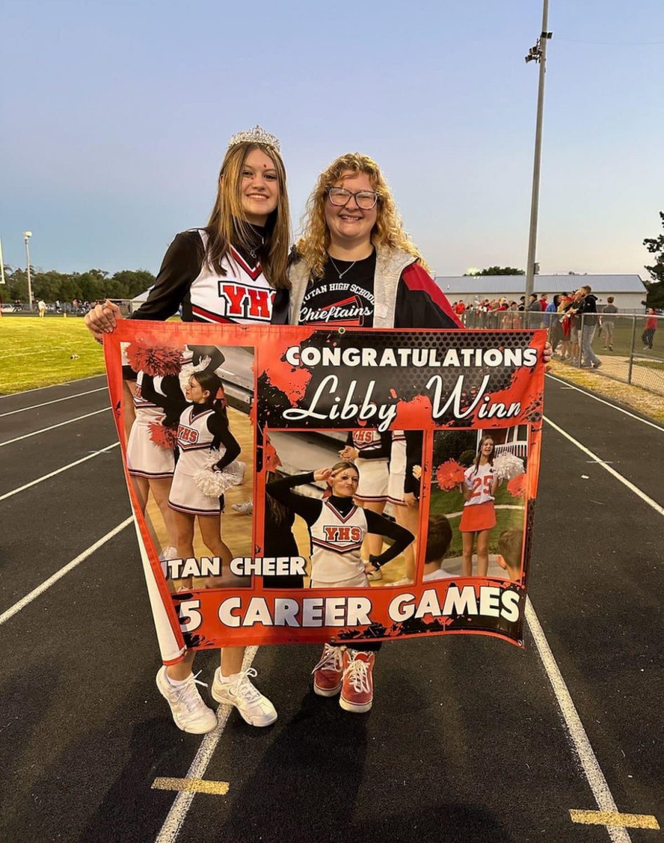 Senior Libby Winn poses for a picture with her head coach Megan Encarnacion. Winn won this award on Sept. 6, 2024.