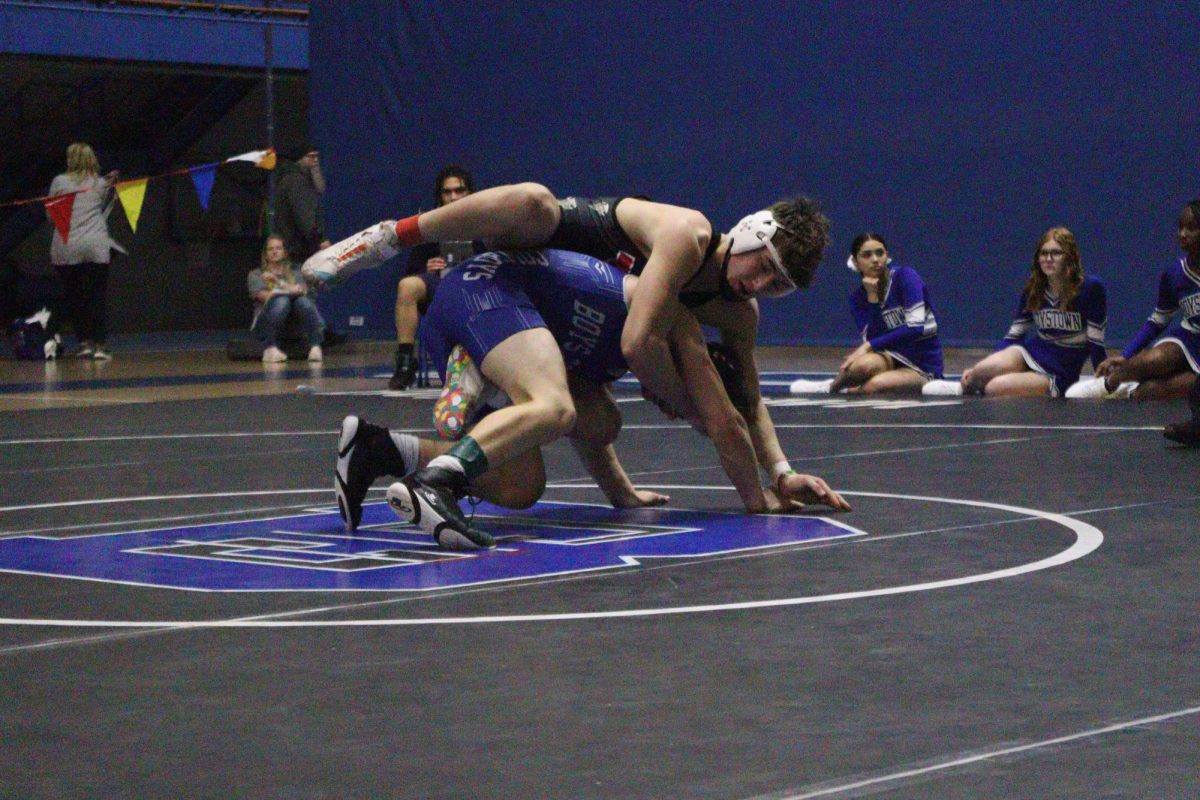 Max Egr competes in a wrestling match at Boystown. Egr trained hard for this match and looked forward to beating the opponent.  