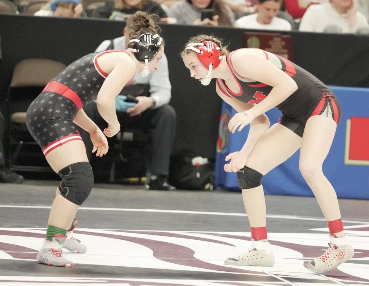 Junior Jordyn Campbell starts her match against her Weeping Water opponent at the 2024 state tournament. Campbell ended the tournament as state champion.