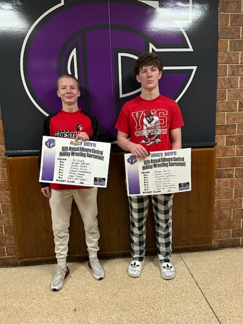 At last year's Filmore Central meet, Eli Kult poses for a picture with older brother Jesse Kult. Besides Isaac Kult, who started wrestling in junior high, all the brothers started wrestling in kindergarten. 