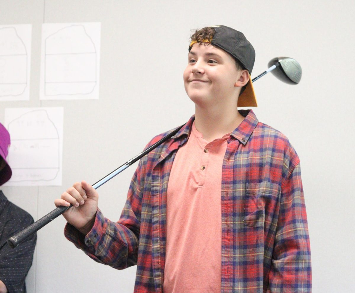 On Adam Sandler Day during homecoming week, sophomore Chase Schake joins in on an interactive world history project.  About 73 percent of students dressed up that day. “I was excited to dress up as Happy Gilmore for Adam Sandler Day because it is one of my favorite movies,” Schake said.