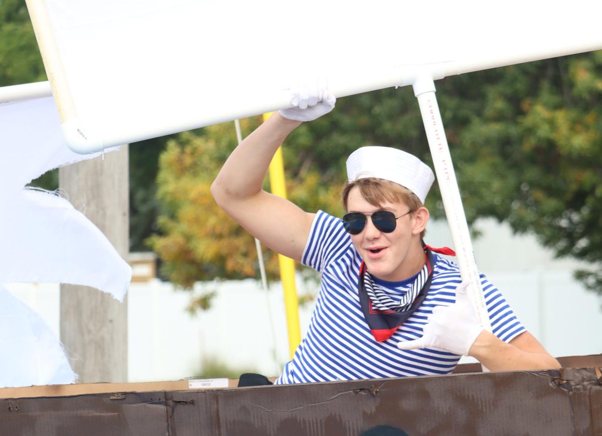 Sophomore Kale Hoffer dresses up as a sailor on the sophomore class float for the 2025 homecoming parade. This year, the sophomore class float theme was “Sink the Clippers” and featured Hoffer and Kaleb Fenner. “I had a lot of fun when we were getting ready to get on the float and when I saw all of the kids’ reactions to our float was cool,” Hoffer said.