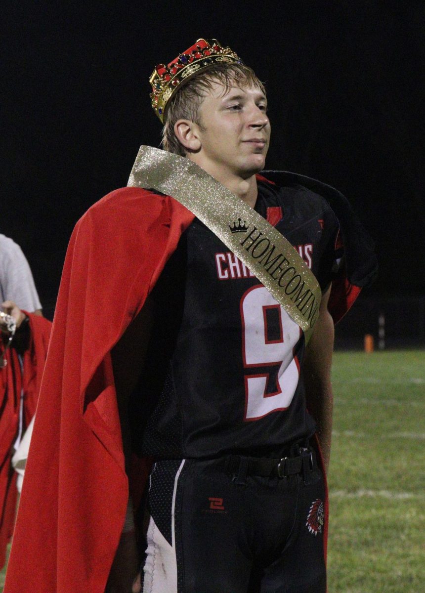 Senior Tyler "Turbo" Keiser gets awarded homecoming king after the homecoming football game. Keiser was crowned by the 2024 homecoming queen Britney Zeleny.