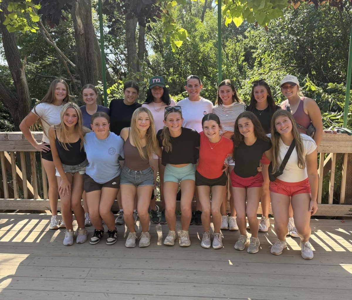 While at Valas for team bonding, the 2025 Patriots softball team poses for a photo. The team decided to do this to help prepare for sub-districts the following week.