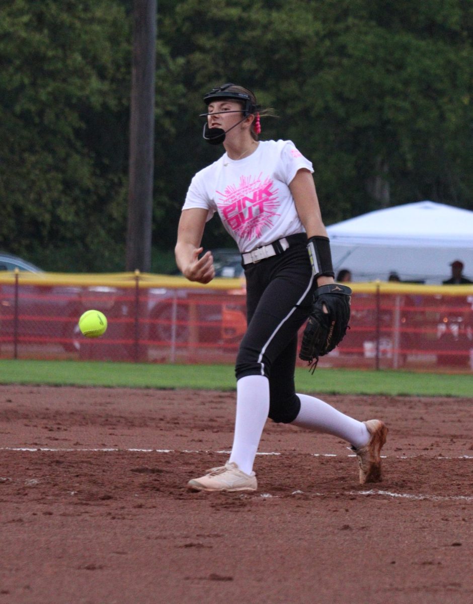 Sophomore Jersey Siske throws a strike during the pink out game against GACC.
Siske had seven strikeouts this game.