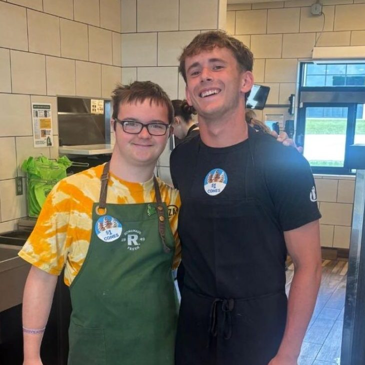 Senior Carson Jurey poses for a picture with co-worker sophomore Ben Waltz. Jurey and Walz worked a total of eight shifts together during the summer.