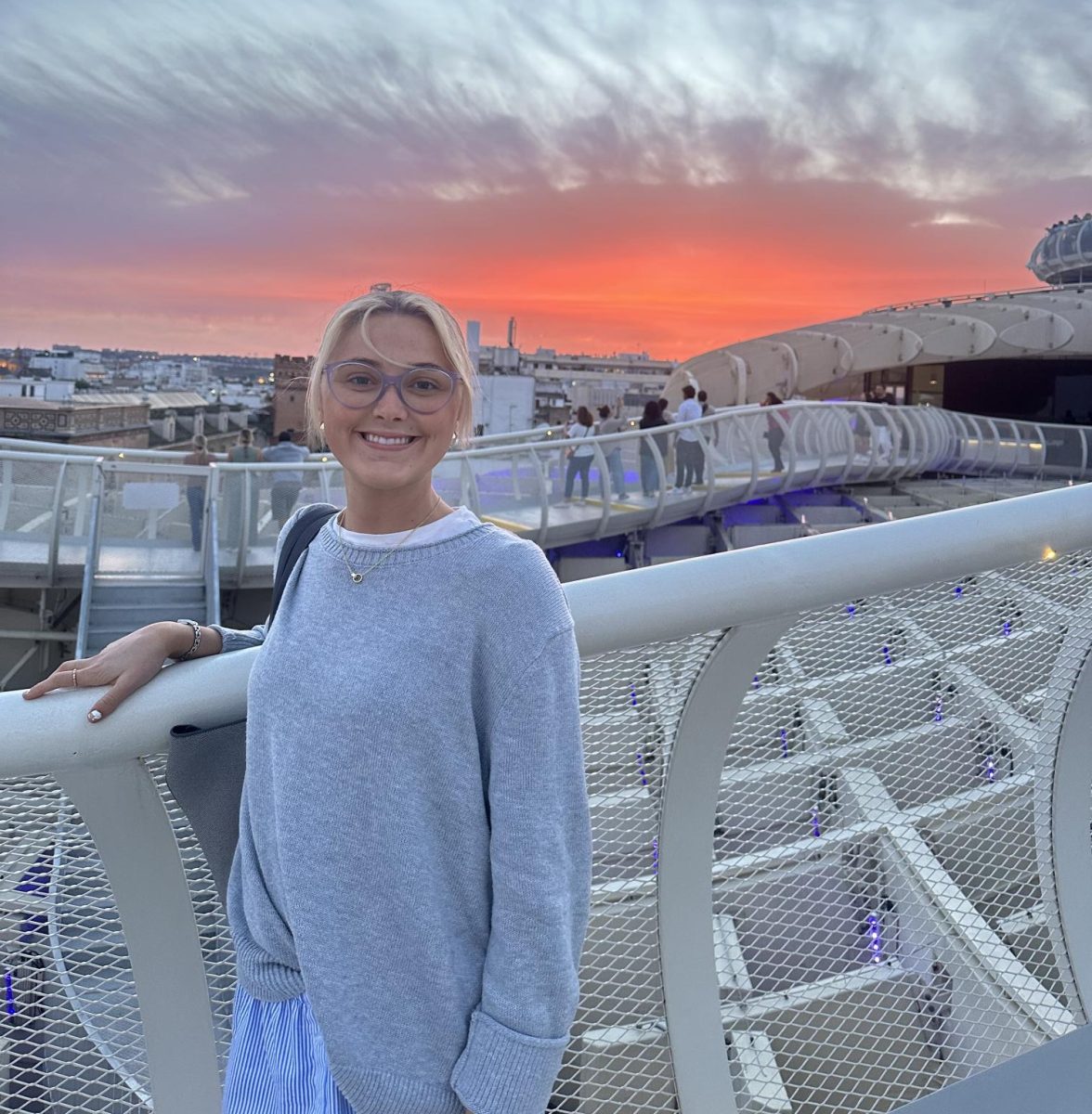 Brennan poses with the Seville sunset in the background at Setas. Setas, which in English means mushroom, is an art formation where people can walk on and overlook the landscape.