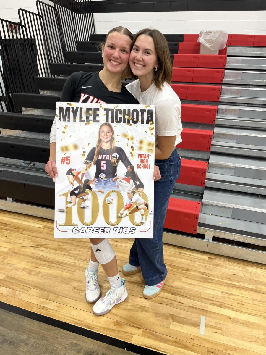 Mylee Tichota and Maura Tichota pose for a picture after the DC West game. Mylee Tichota got her 1,000 dig during this game. 