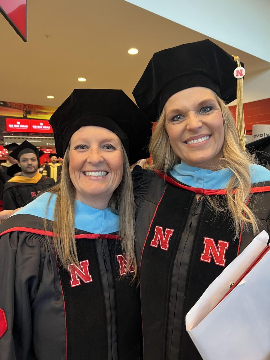 Novotny takes a selfie with a friend after she graduated. Novotny graduated from The University of Nebraska Lincoln 