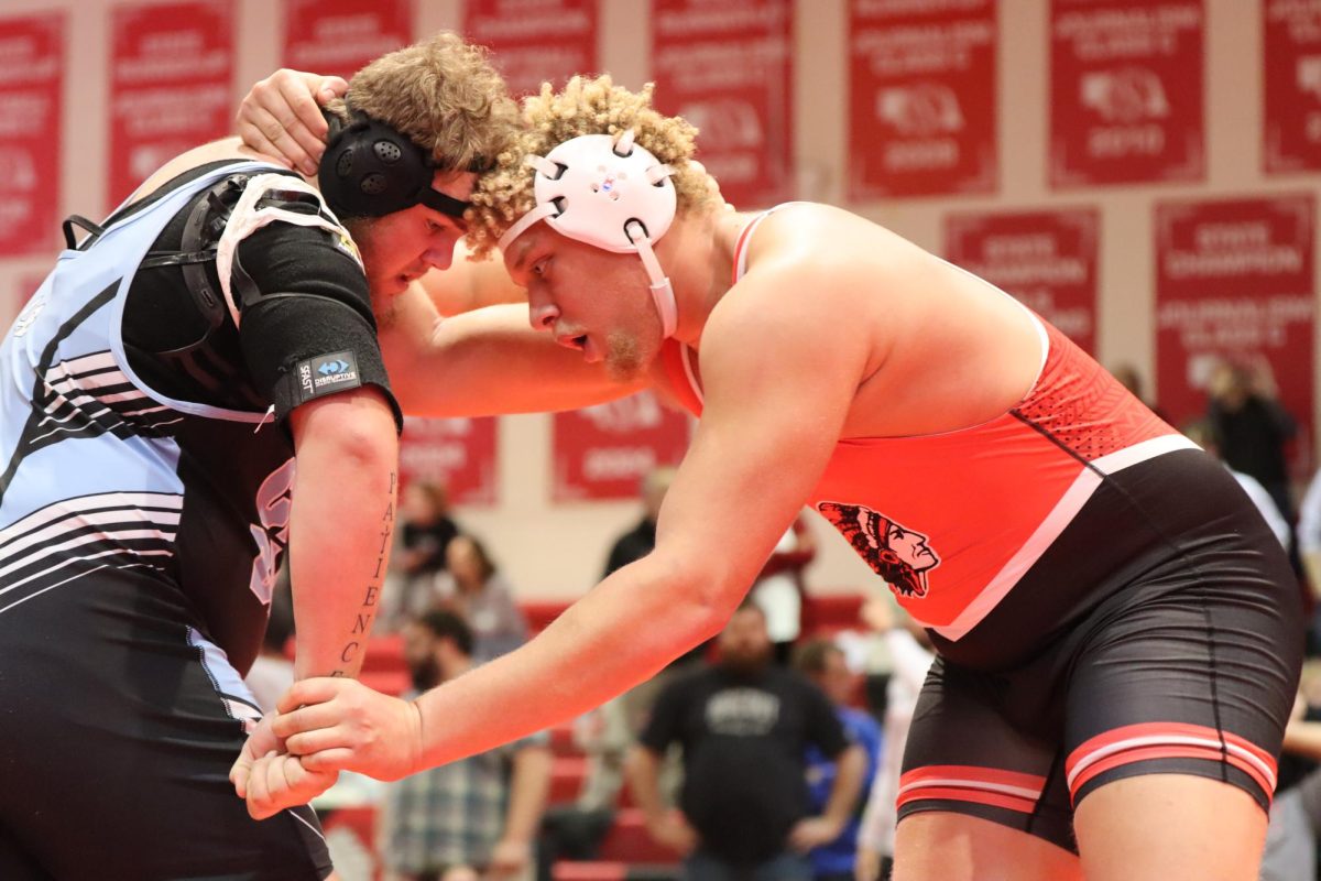 Junior Peyton Reed wins finals match at Yutan invitational. Reed went 3-0 at this tournament.